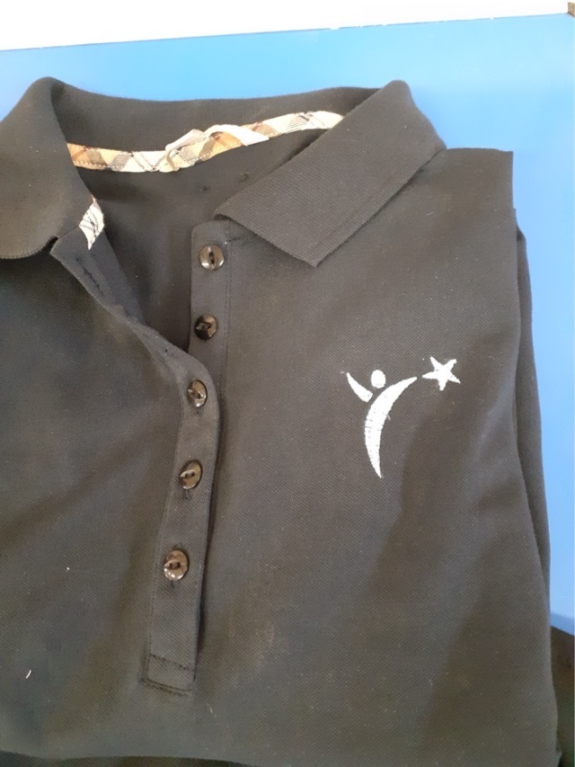 Jean was asked by Evelyn to reproduce a logo on a shirt by making use of her technological skills. The likeness to the original is impressive